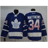 Men Toronto Maple Leafs #34 Auston Matthews Blue Canada Flag Fashion Stitched NHL Jersey